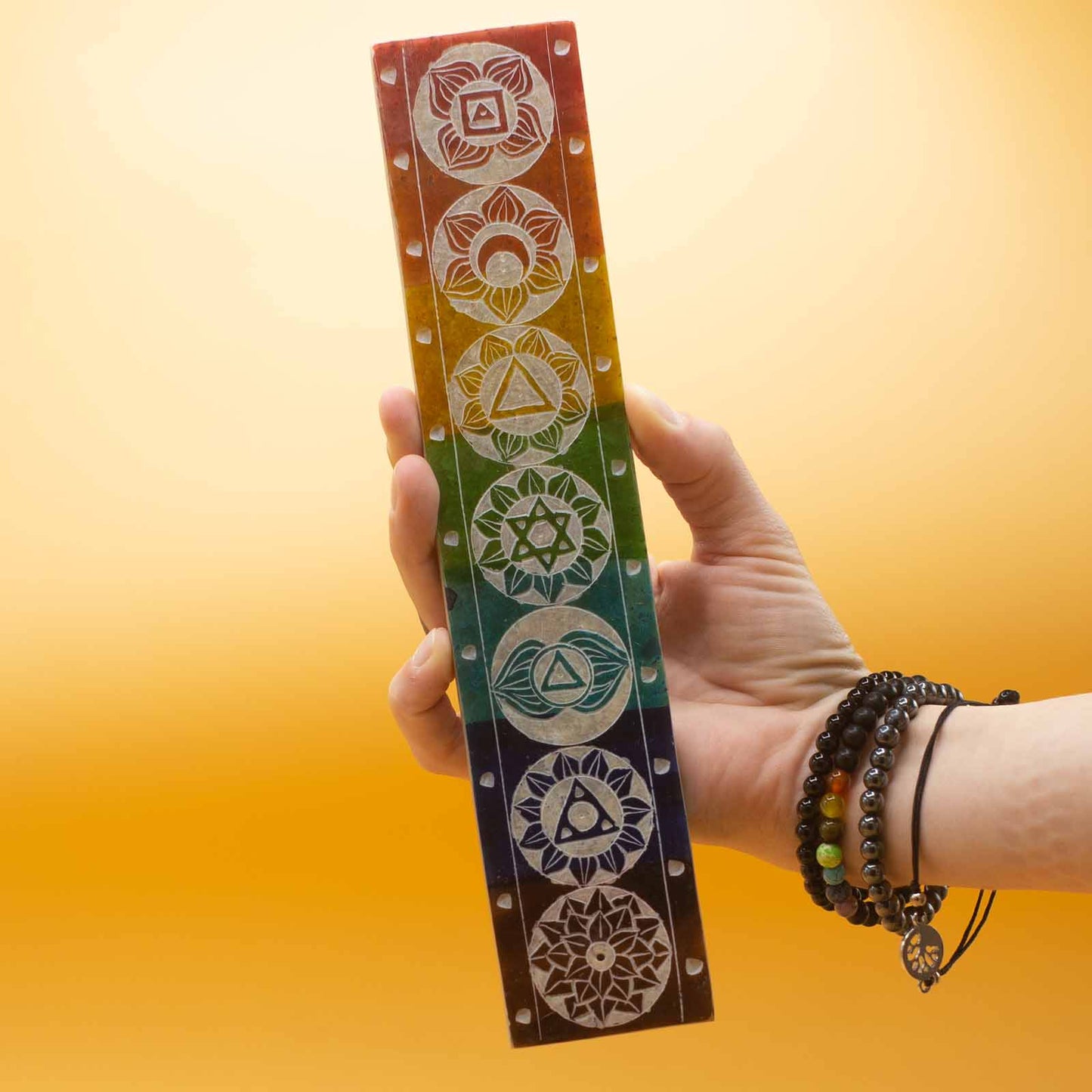 Soapstone 7 chakra incense holder in vibrant colors, measuring 26x5cm, perfect for spiritual practices.