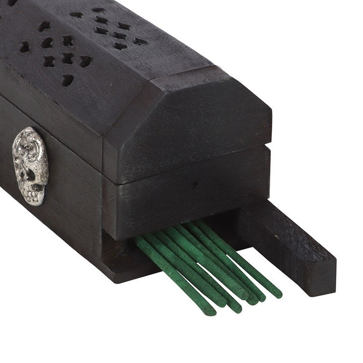 Zombie repellent incense box set featuring a carved skull design and green incense sticks for a spooky atmosphere