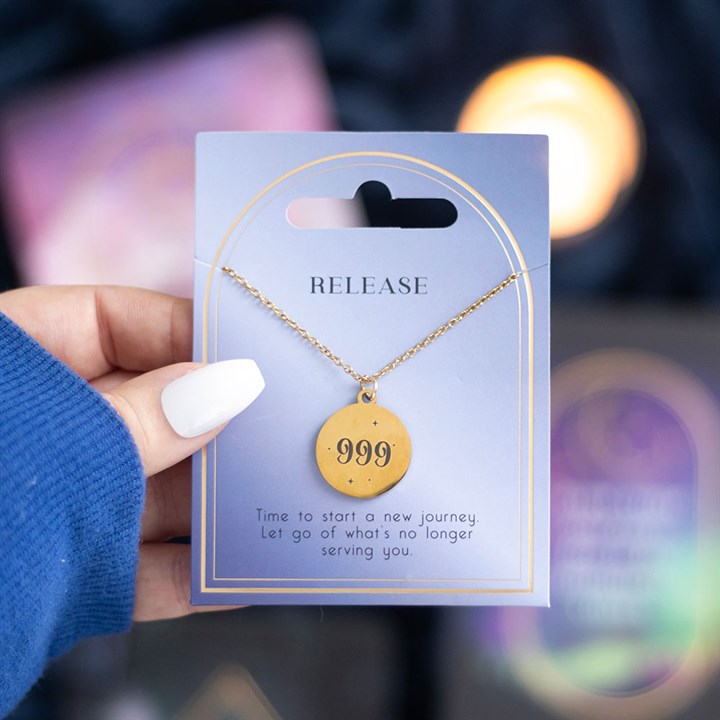 999 angel number necklace displayed on a card, symbolizing new beginnings and personal growth, from Kimchi Toki.