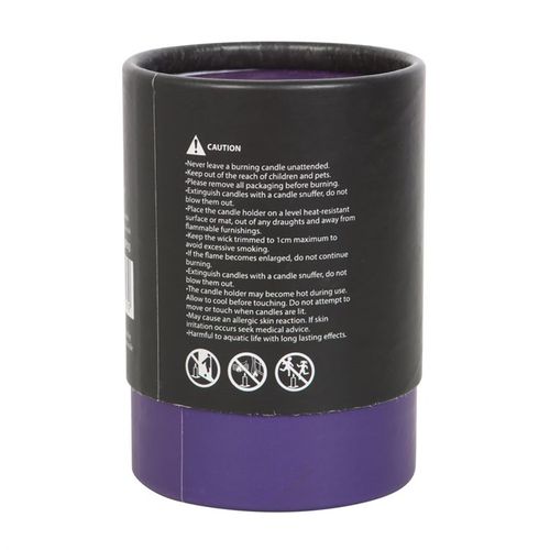 Purple and black candle container with safety warnings.