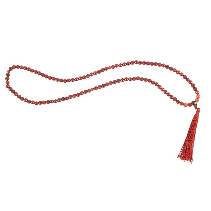 Grounding Mallah necklace made of rosewood and red jasper beads with a tassel, perfect for spiritual practices