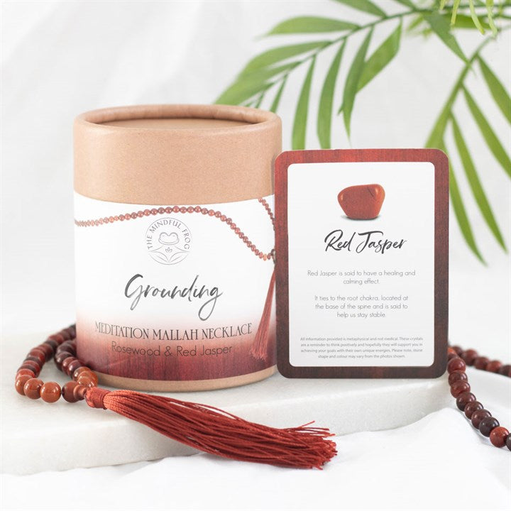 Grounding Mallah necklace made of rosewood and red jasper, designed for meditation, displayed with a guide card