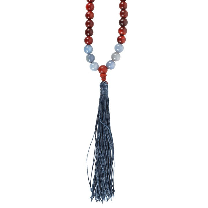 Stunning rosewood and sodalite mallah necklace with a blue tassel, perfect for Reiki healing necklaces and spiritual practices.