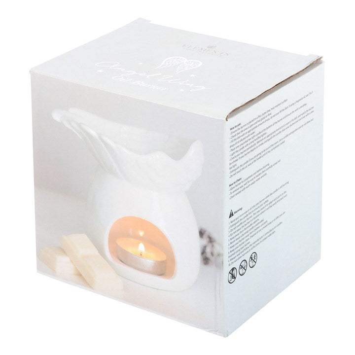 Elegant Angel Wing Dish oil burner in white ceramic with a candle, perfect for creating a soothing ambiance.