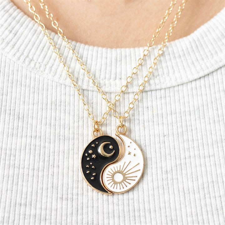 Yin Yang Best Friend Necklace pair with gold chains, featuring black and white pendants symbolizing harmony and friendship