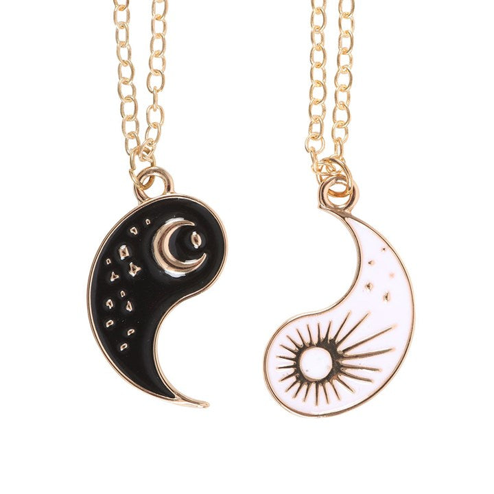 Yin Yang Best Friend Necklace pendants in black and white, featuring celestial designs and gold chains for meaningful friendship gifts.