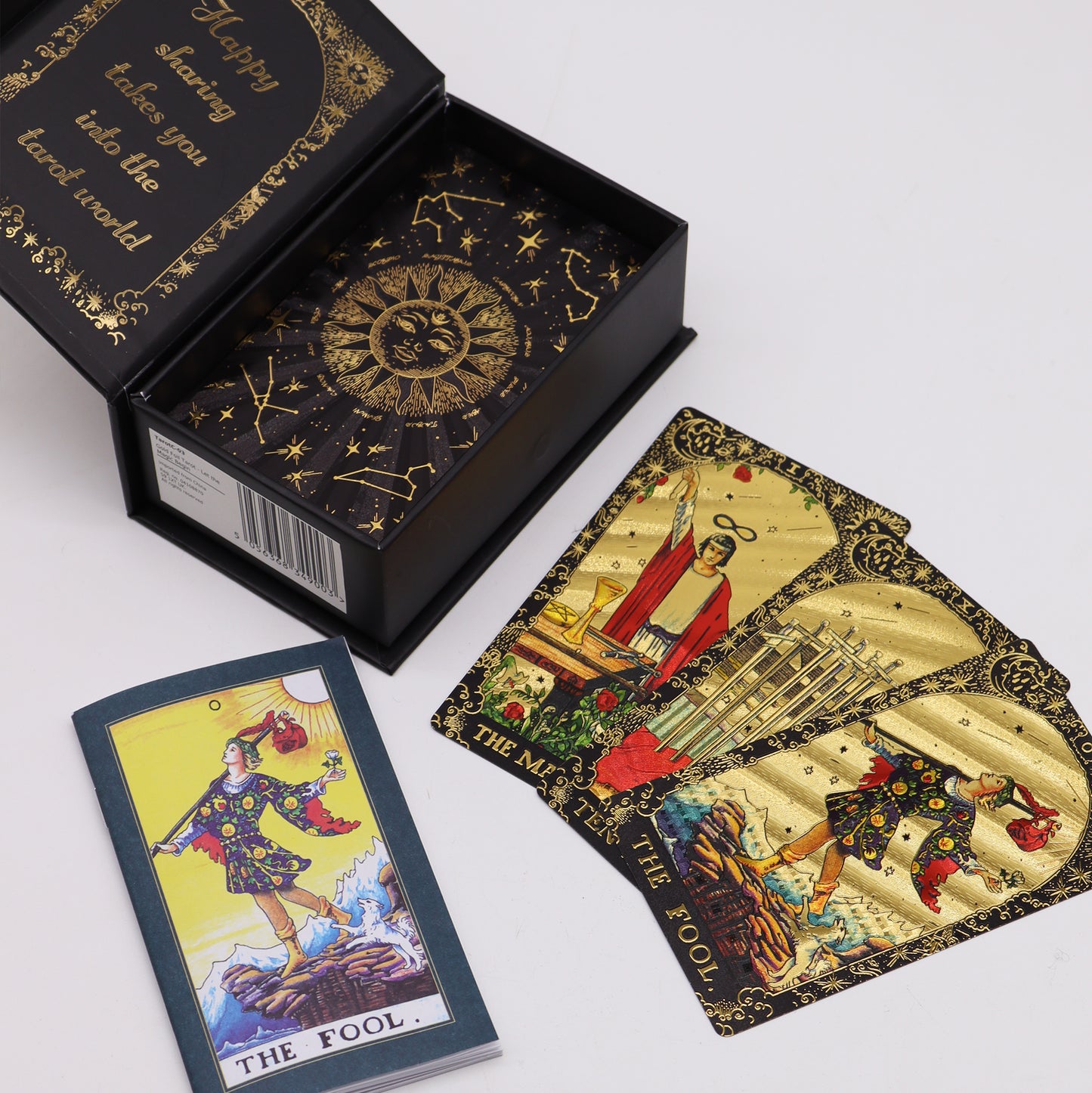 Premium gold foil tarot cards with a companion guidebook, housed in an elegant celestial-themed magnetic gift box.
