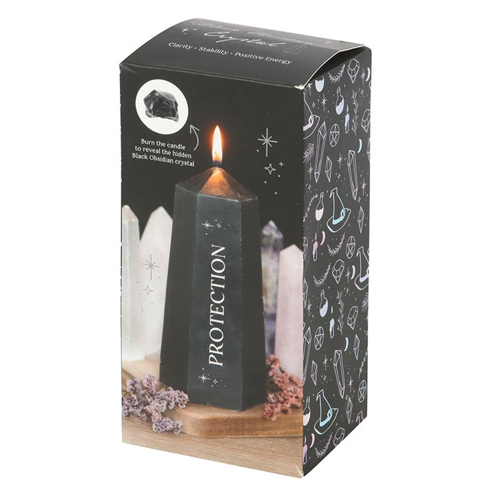 Protection crystal candle featuring rough black obsidian, designed for clarity and positive energy, with a lit flame