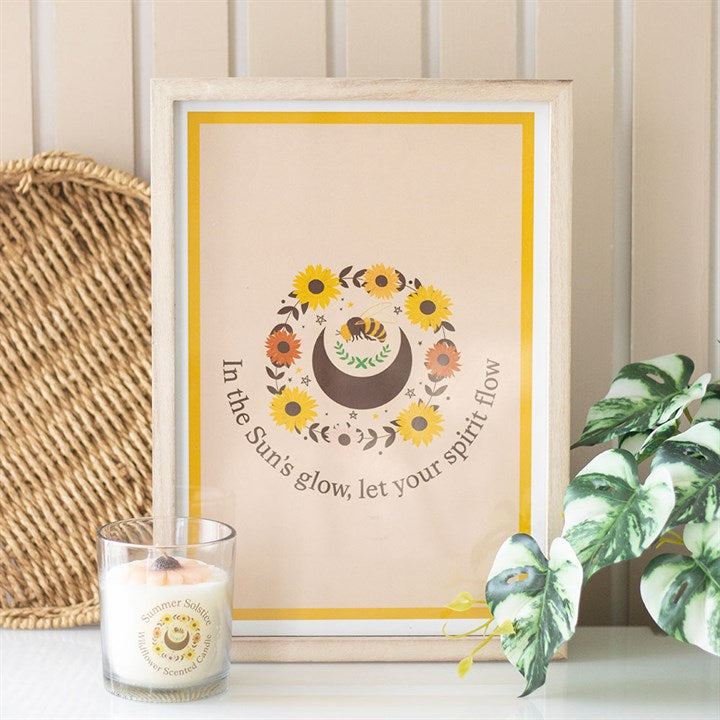Framed spiritual wall art print featuring flowers and the quote In the Sun's glow, let your spirit flow, perfect for home decor
