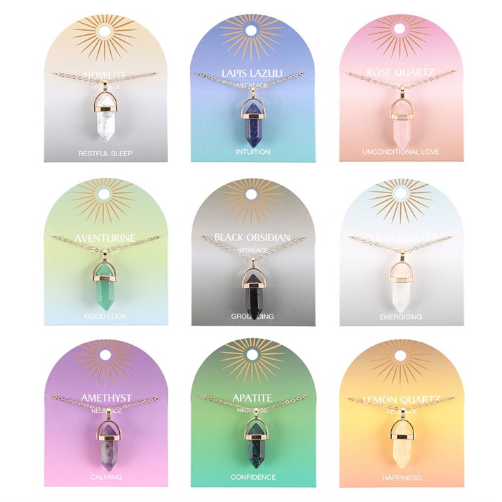 Set of 9 crystal pendant necklaces featuring various gemstones on colorful card displays, perfect for spiritual healing.