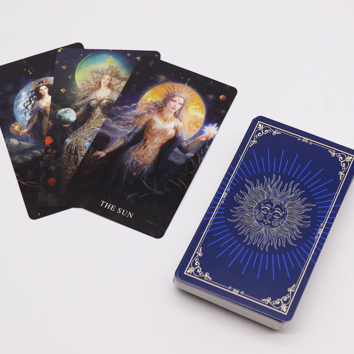Goddess Arcana tarot cards featuring stunning illustrations, including The Sun card, alongside a beautifully designed card box