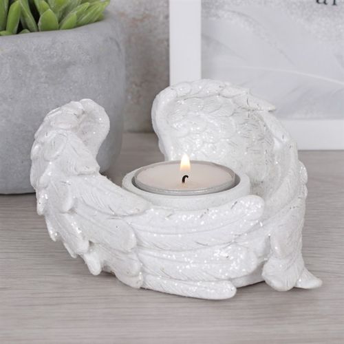 Glitter Angel Wing Candle Holder in white, perfect for adding elegance to any space with a candle