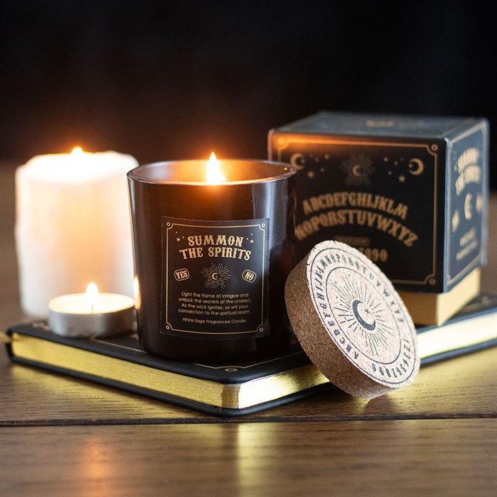 Summon the Spirits Talking Board Aromatherapy white sage candle in a black jar with a natural cork lid