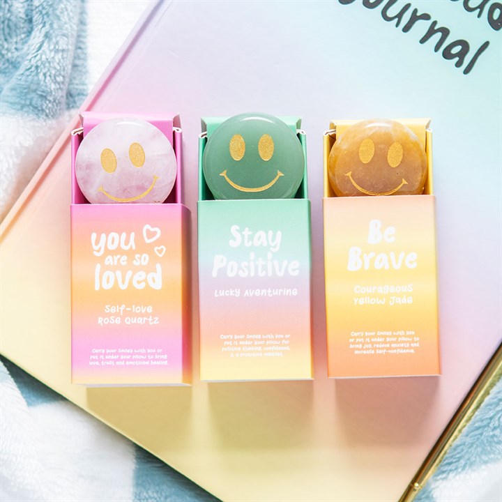 Stay Positive Aventurine Happy Face Crystal in a colorful box promoting positivity and self-love