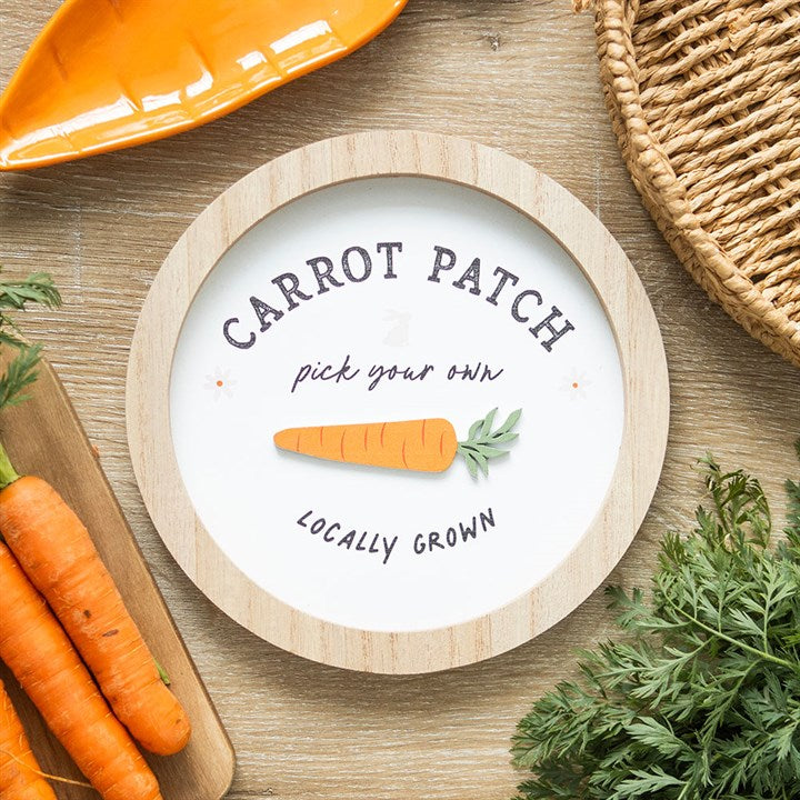 Carrot Patch wall decor with a wooden frame featuring a vibrant carrot and the phrase pick your own