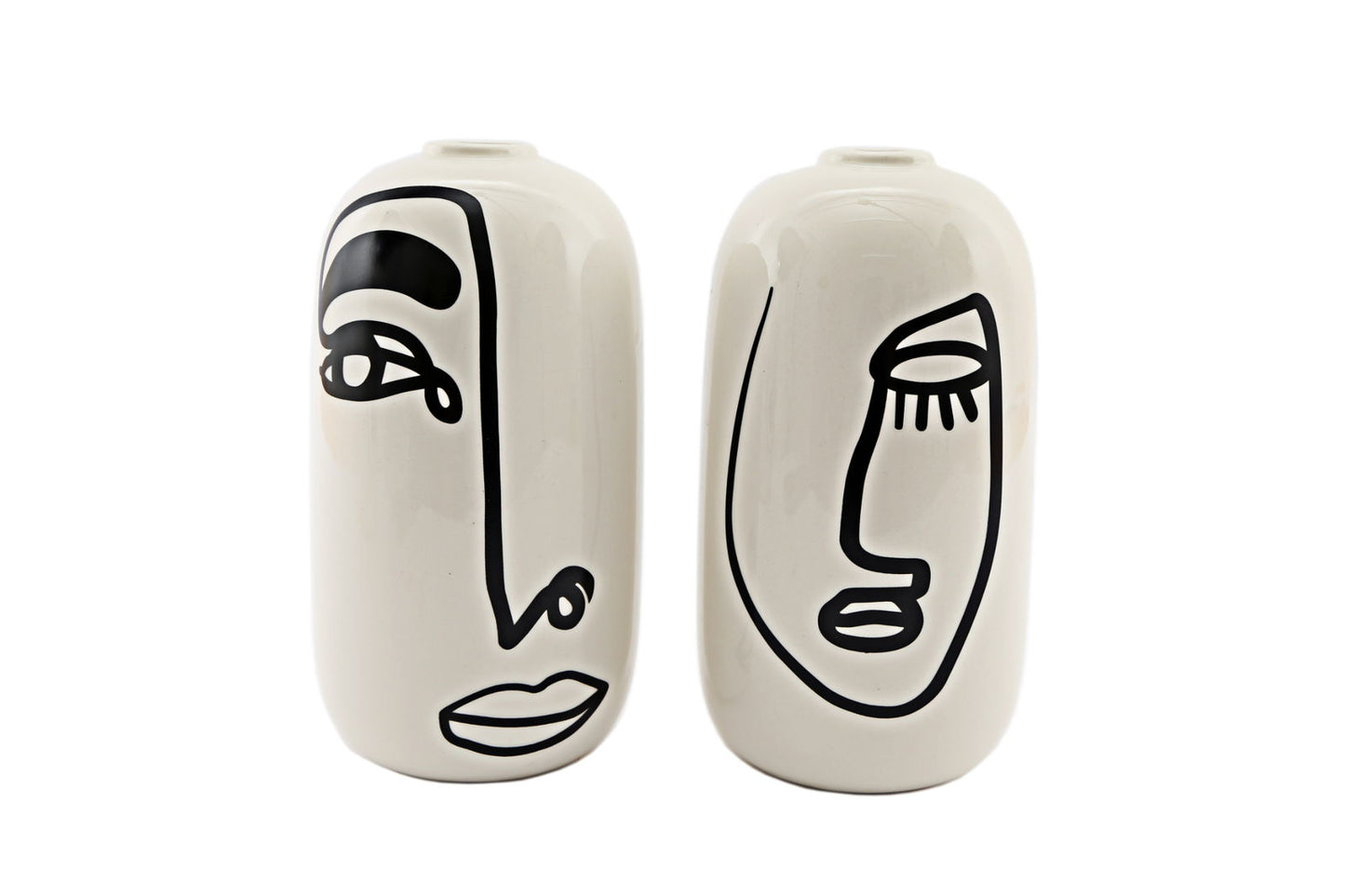 Set of ceramic vases with face design featuring abstract black line art on white vases by Geko Products