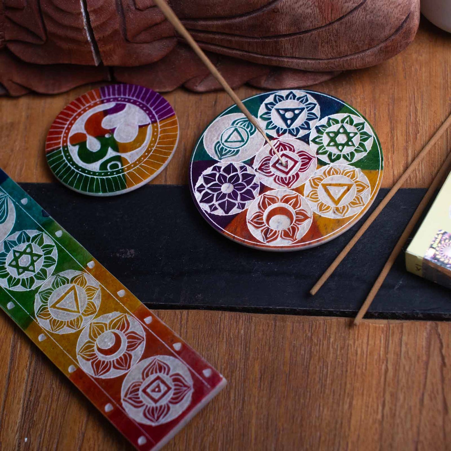 Soapstone 7 chakra incense holder set with colorful chakra designs for meditation and relaxation