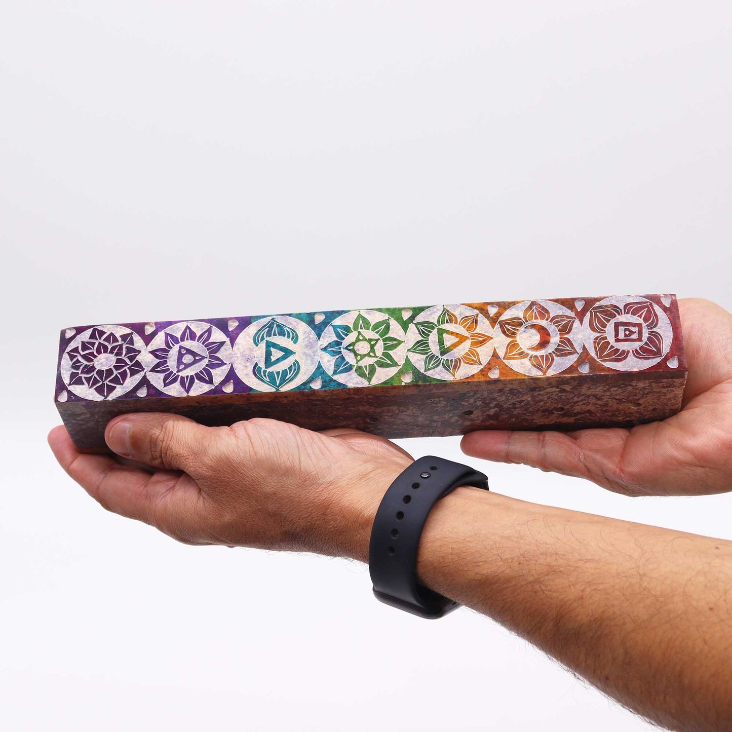Chakra soapstone incense holder featuring intricate designs for spiritual practices and home decor