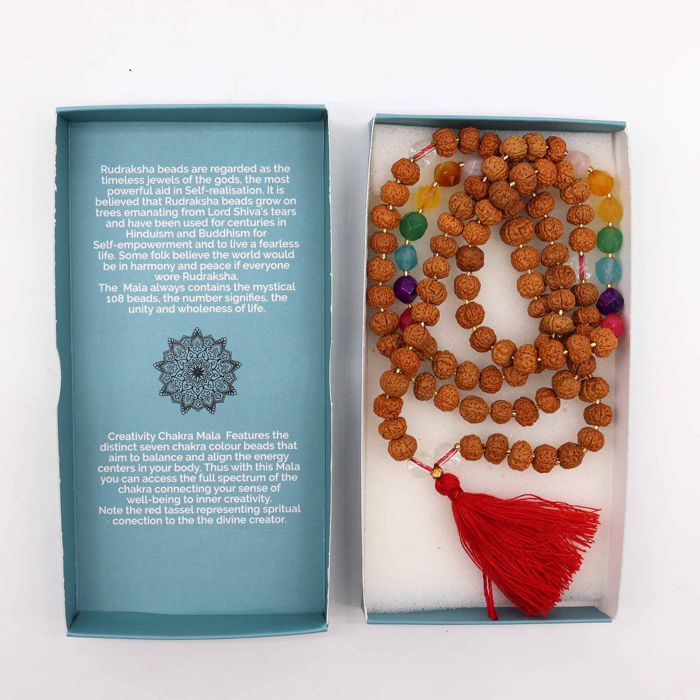 Creativity Chakra necklace made of Rudraksha beads with colourful accents and a red tassel for spiritual healing