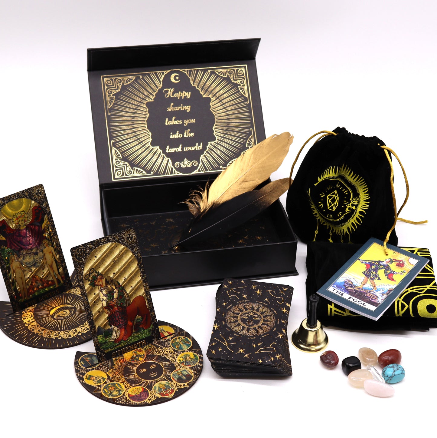 Gold Foil Deluxe Tarot Cards With Guidebook displayed in a beautiful packaging with crystals and accessories
