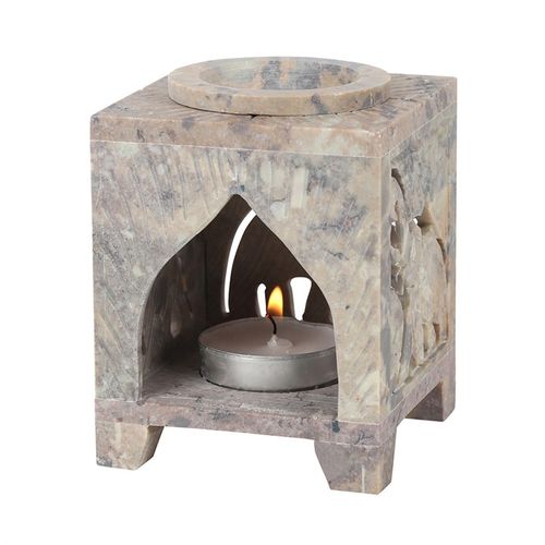 Carved Elephant Oil Burner made from soapstone with intricate designs and a candle holder
