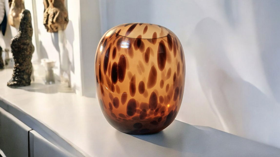 Leopard print glass vase by Geko Products with amber and brown spotted design