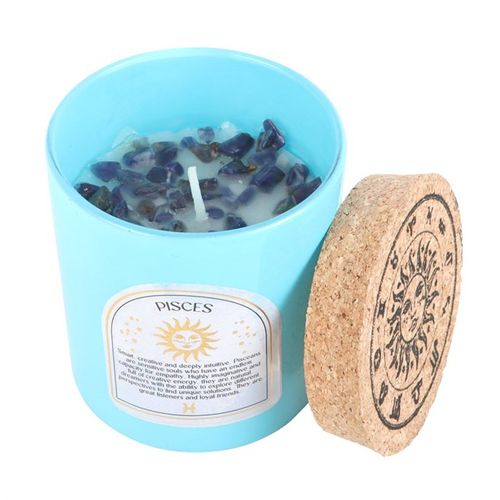 Pisces gardenia candle in a light blue container with gemstones and a cork lid