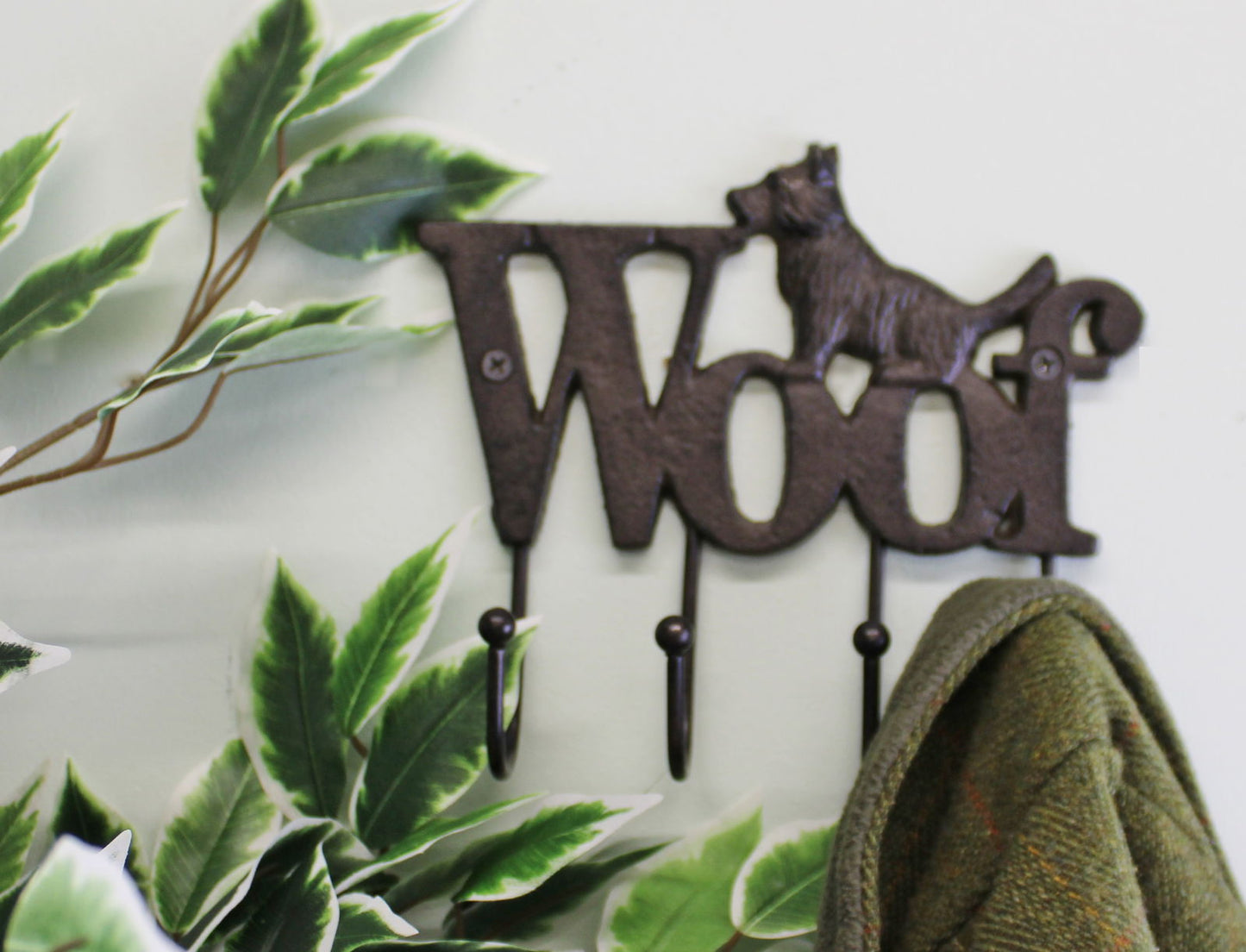Rustic dog wall hooks with Woof text and dog silhouette in dark metal for hanging coats or keys