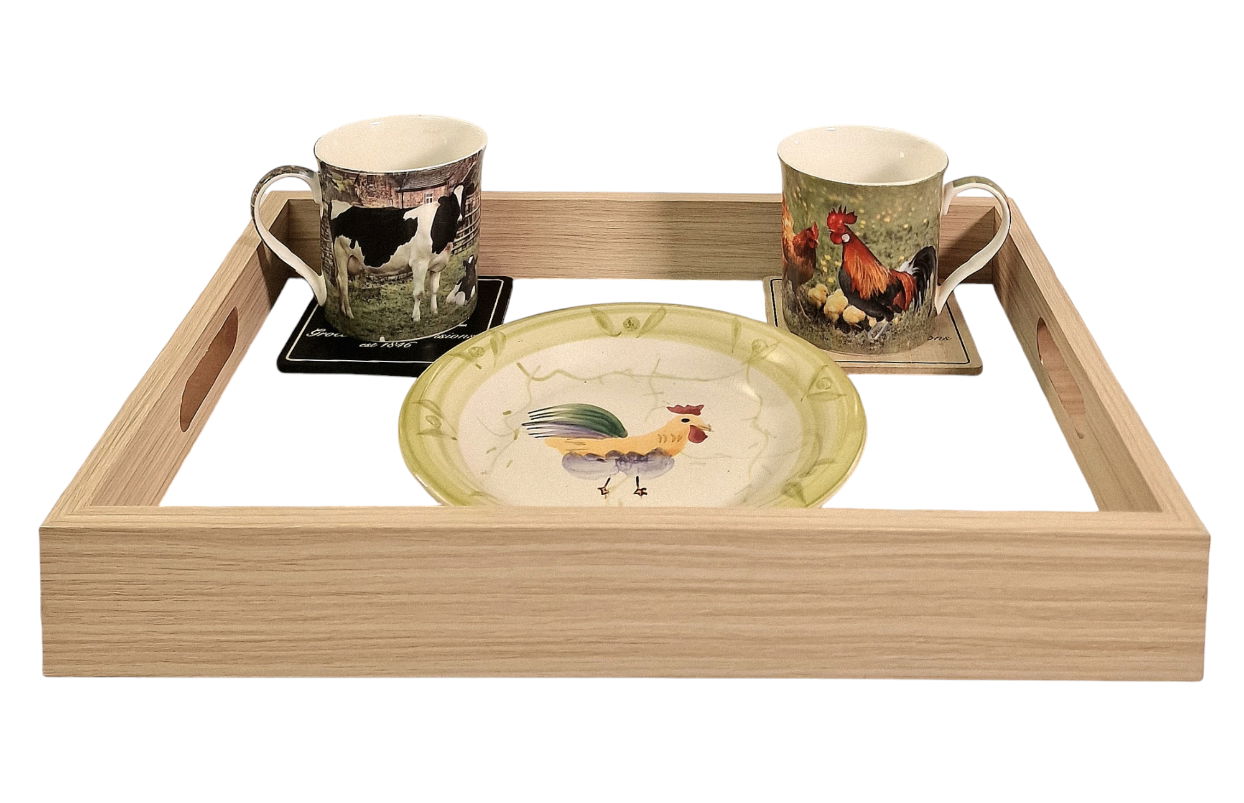 Geko Products cream linen serving trays with handles holding two animal print mugs and a decorative rooster plate