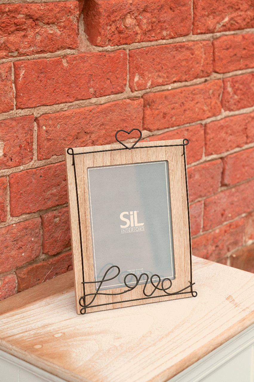 Geko Products wooden photo frame 4x6 with wire heart and love design on light wood surface