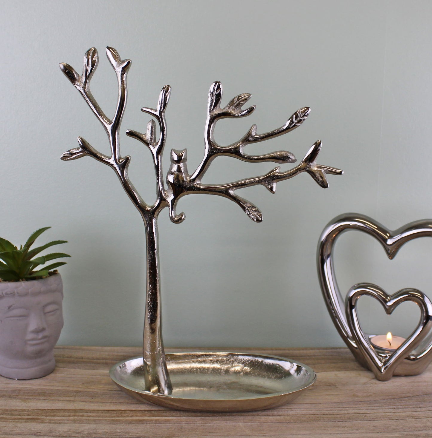 Silver cat jewellery stand shaped like a tree with a cat figure on branches for organizing jewelry