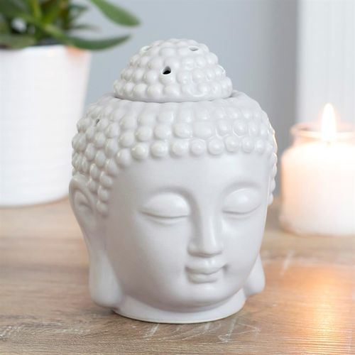 Small grey oil burner designed as a Buddha head for relaxing aromatherapy