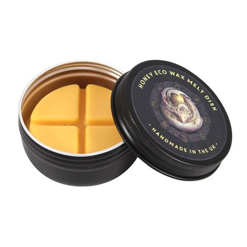 Ostara wax melt burner gift set featuring a honey eco wax melt disk in handmade UK packaging with four segments.