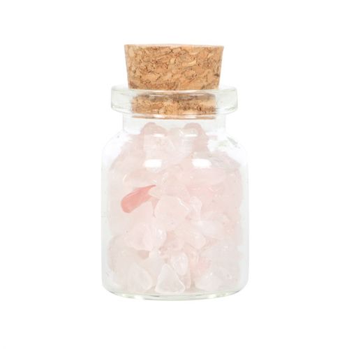 Small jar of rose quartz in matchbox with delicate crystals and natural cork lid, perfect for spiritual healing and decoration