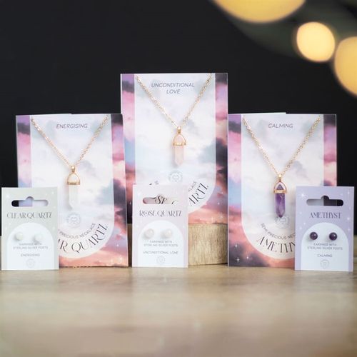 Amethyst Crystal Card featured with a beautiful necklace on a pastel backdrop showcasing Kimchi Toki's spiritual jewelry.