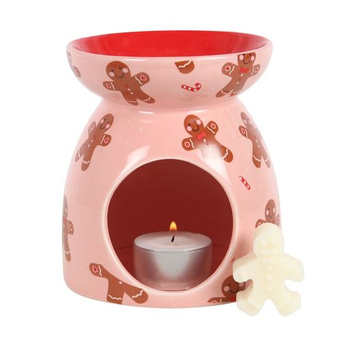 Gingerbread wax melt burner gift set featuring a pink ceramic burner with gingerbread designs and a tea light candle