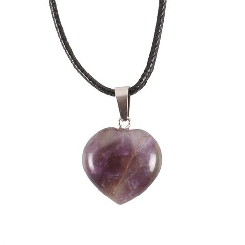 Amethyst Crystal Necklace featuring a heart-shaped pendant on a black cord for stylish spiritual healing.