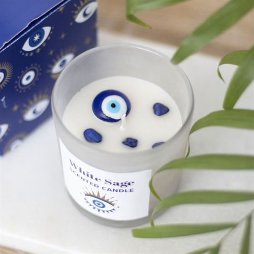 White Sage protection candle with blue crystal chips and an eye symbol for spiritual cleansing and protection