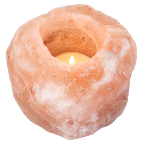 Natural Himalayan salt candle holder with a warm, glowing candle, ideal for creating a calming atmosphere