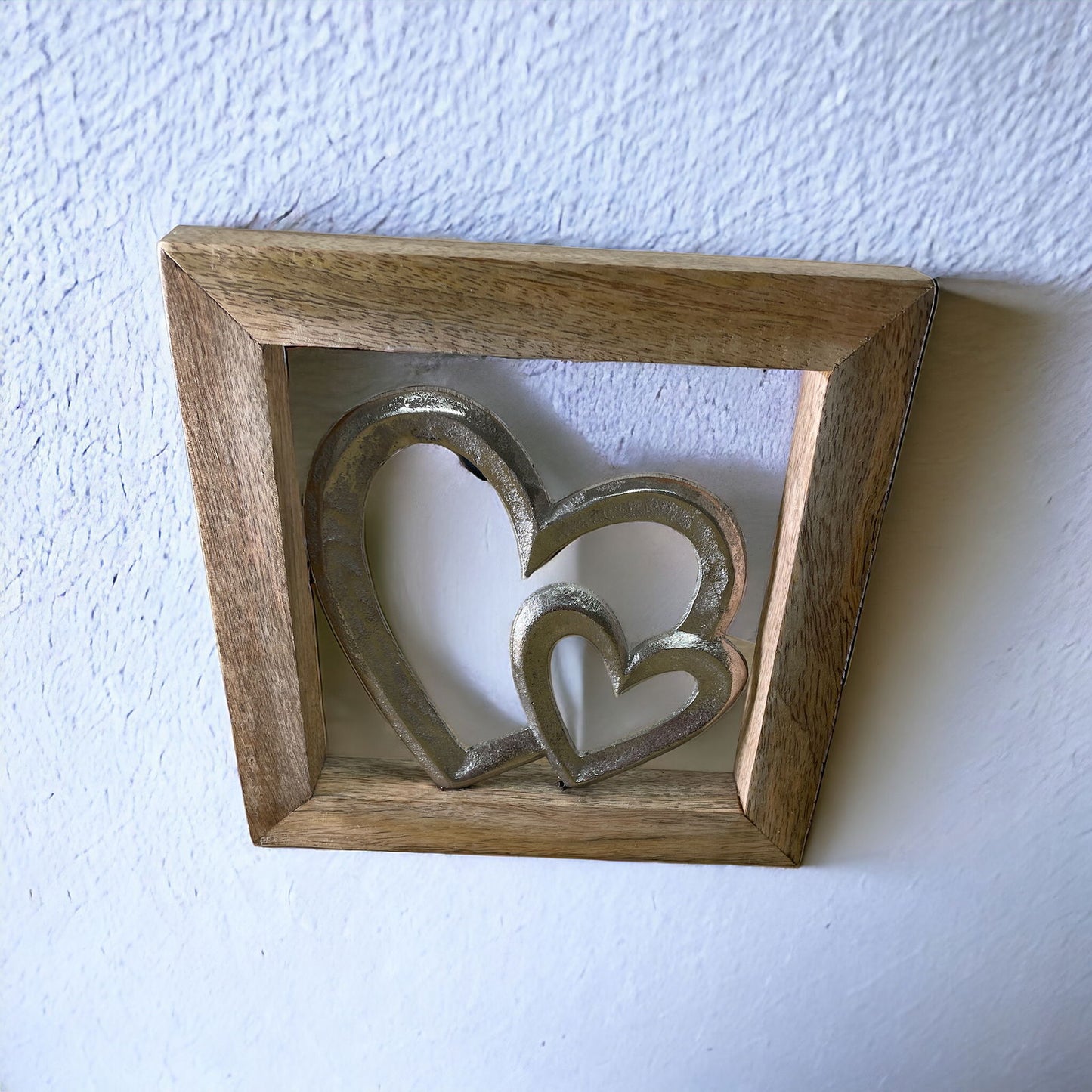 Geko Products wooden framed metal hearts wall decor with two intertwined metal hearts in natural wooden frame