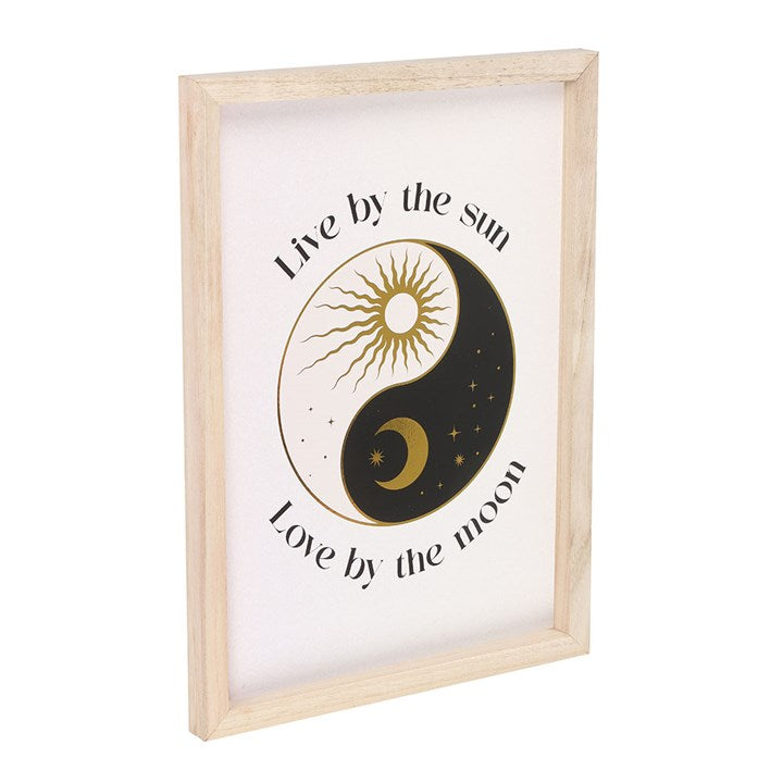 Yin Yang Wall Art framed print with sun and moon design featuring live by the sun love by the moon text