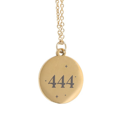 Golden 444 angel number necklace featuring a round pendant engraved with the number 444 for protection and spiritual guidance