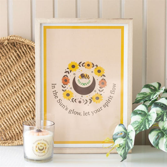 Framed spiritual wall art print featuring flowers and the quote In the Sun's glow, let your spirit flow, perfect for home decor