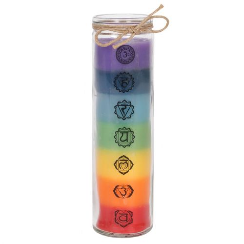 Colorful tall chakra candle in a glass holder, featuring chakra symbols on each layer for energy alignment