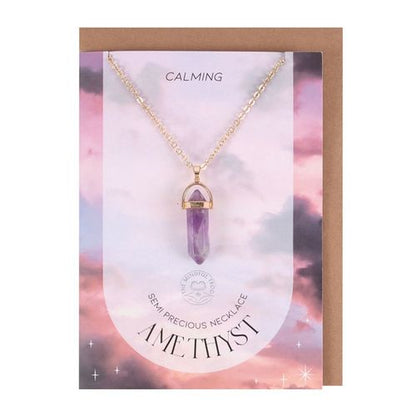 Amethyst Crystal Card featuring a calming pendant necklace in gold with a semi-precious amethyst stone