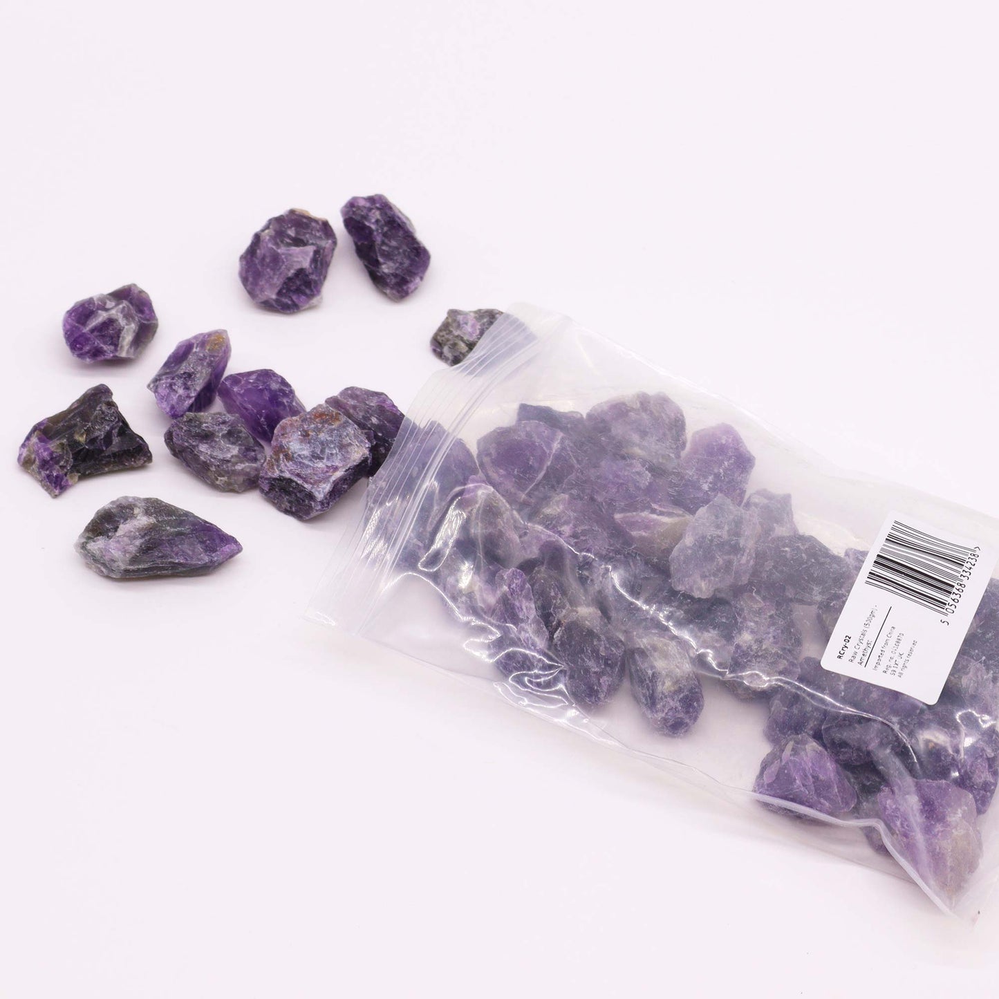 Natural Amethyst raw stones in 500g bulk, ideal for stress relief, energy healing, and enhancing spiritual awareness.
