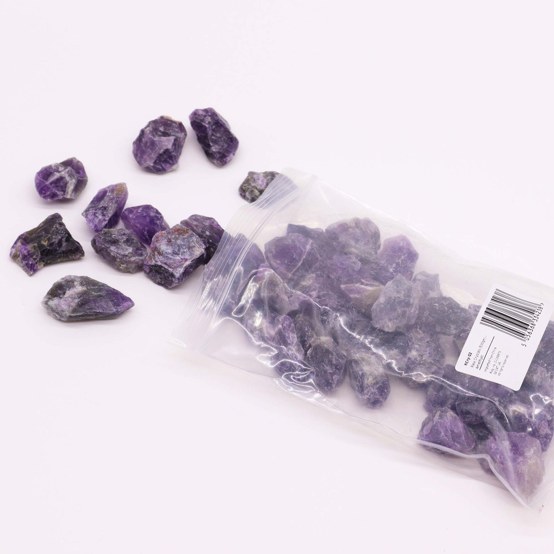 Natural Amethyst raw stones in 500g bulk, ideal for stress relief, energy healing, and enhancing spiritual awareness.
