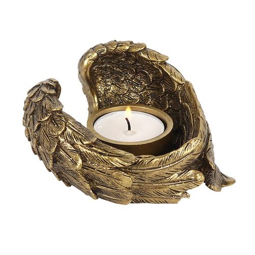 Elegant antique gold angel wing candle holder for home décor, perfect for adding charm to any space