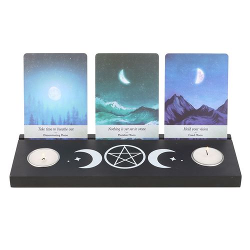 Black tarot card stand tealight holder featuring celestial designs and space for two candles