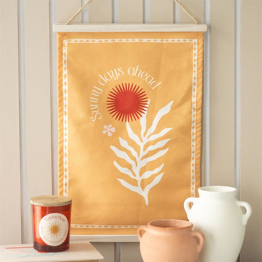 Sunny Days Ahead Wall Hanging, a boho wall hanging for home featuring a floral design in warm tones